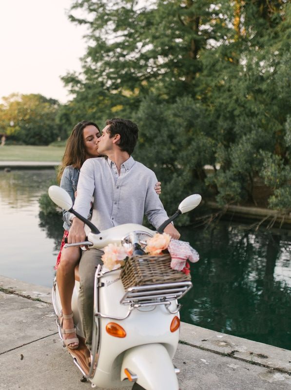 Couple sharing a toast with champagne in the park (another frame from the session)