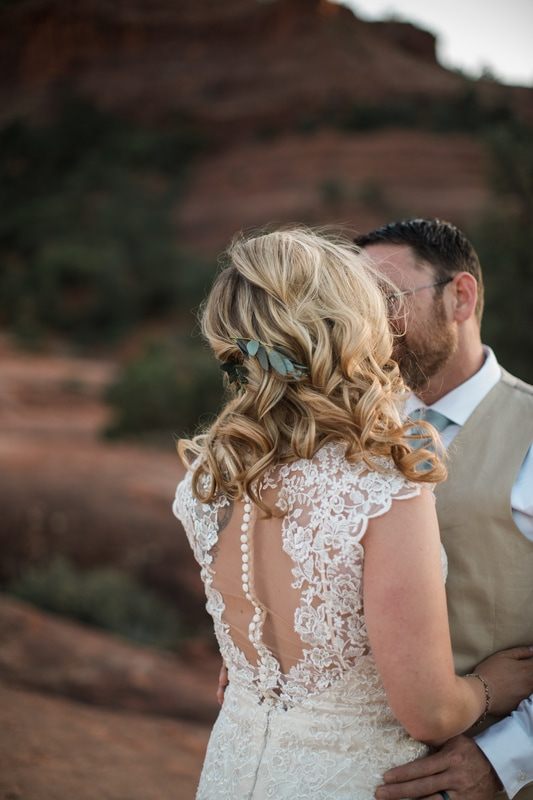 Golden hour portrait of the newlyweds in the Sedona desert