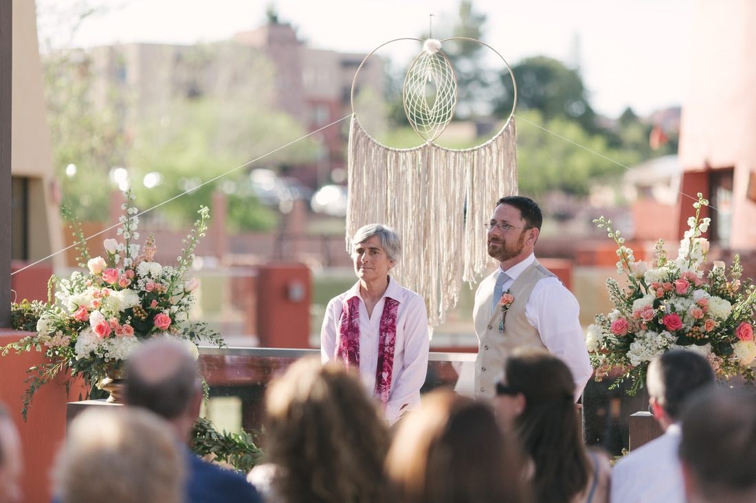 Bride and groom portrait among Sedona's red rock formations