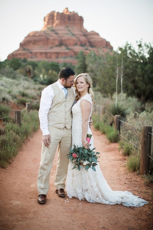 Wedding portrait set against Sedona's iconic red rock landscape