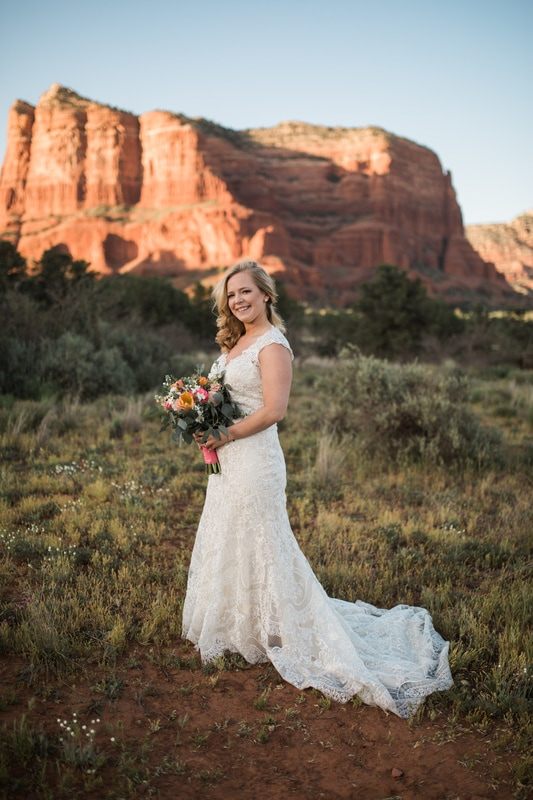 Wedding portrait set against Sedona's iconic red rock landscape
