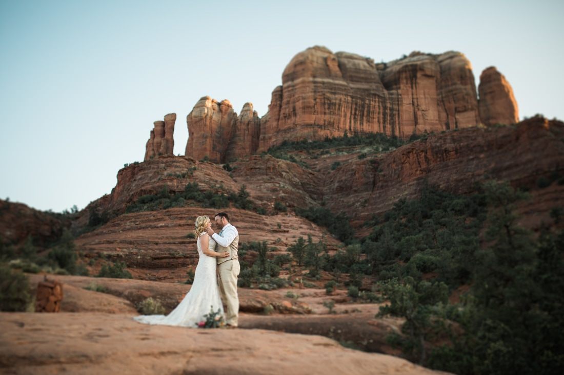 Wedding portrait set against Sedona's iconic red rock landscape