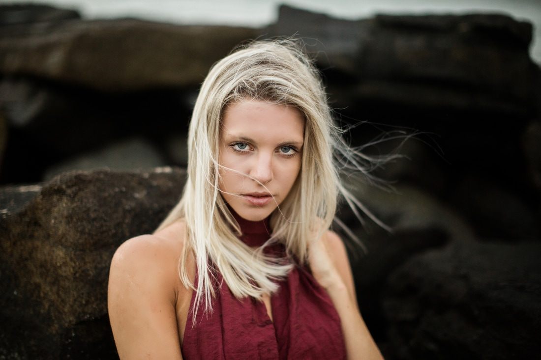 Wind-blown portrait of Audrey Smoak on the beach at Sullivan's Island, South Carolina