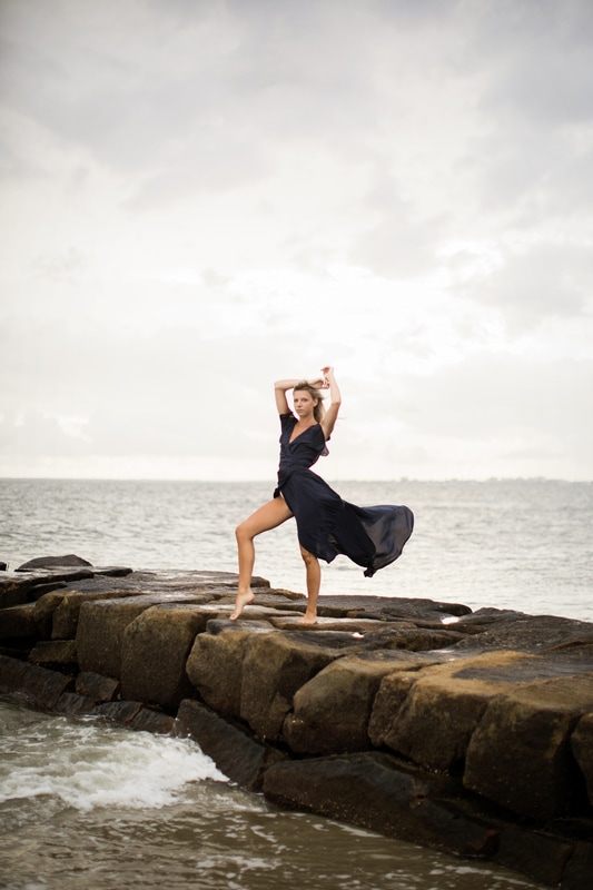 Audrey Smoak framed by beach grass and dunes at Sullivan's Island, SC, another frame from the session