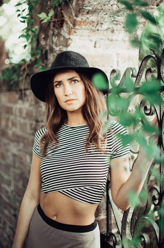 Susan smiling during her portrait session in downtown Charleston, SC