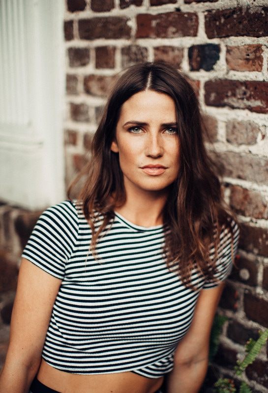 Candid portrait of Susan in downtown Charleston's historic district