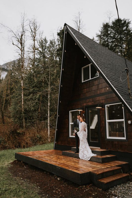Bride and groom sharing a first look moment at That PNW Cabin.