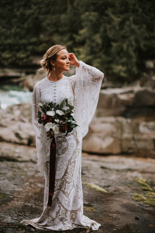 Bride and groom sharing a first look moment at That PNW Cabin.