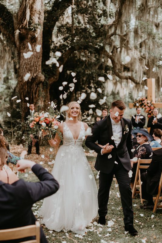 Alexis dancing during the reception on the barns back porch