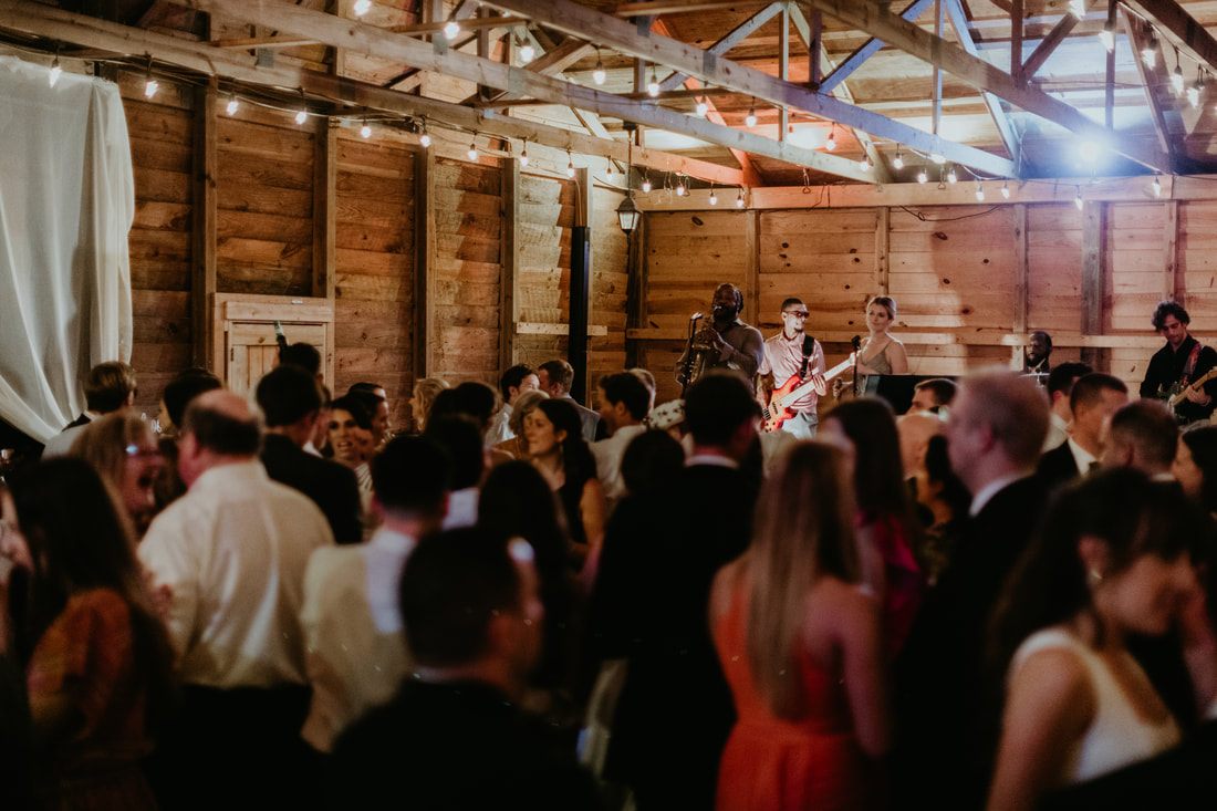 Alexis sharing a quiet moment in front of the Johns Island barn venue