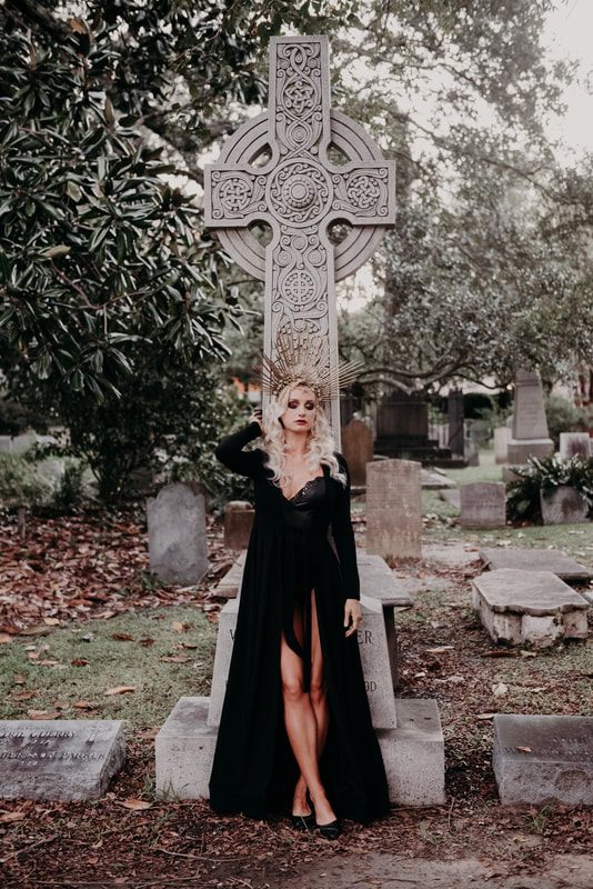 Moody styled portrait among historic headstones in a Charleston cemetery