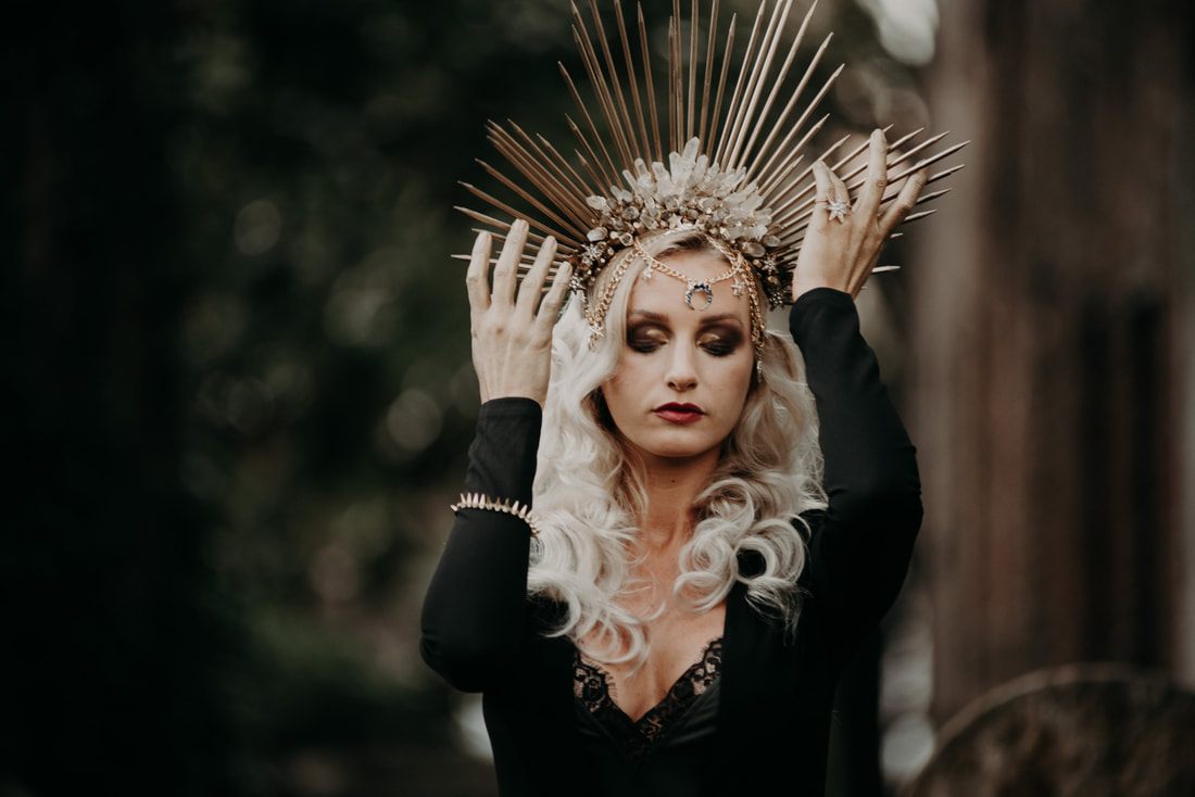 Moody styled portrait among historic headstones in a Charleston cemetery