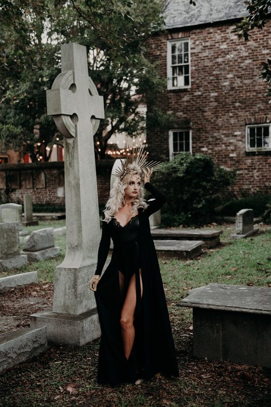 Fog drifting through a historic Charleston cemetery during a Halloween portrait shoot