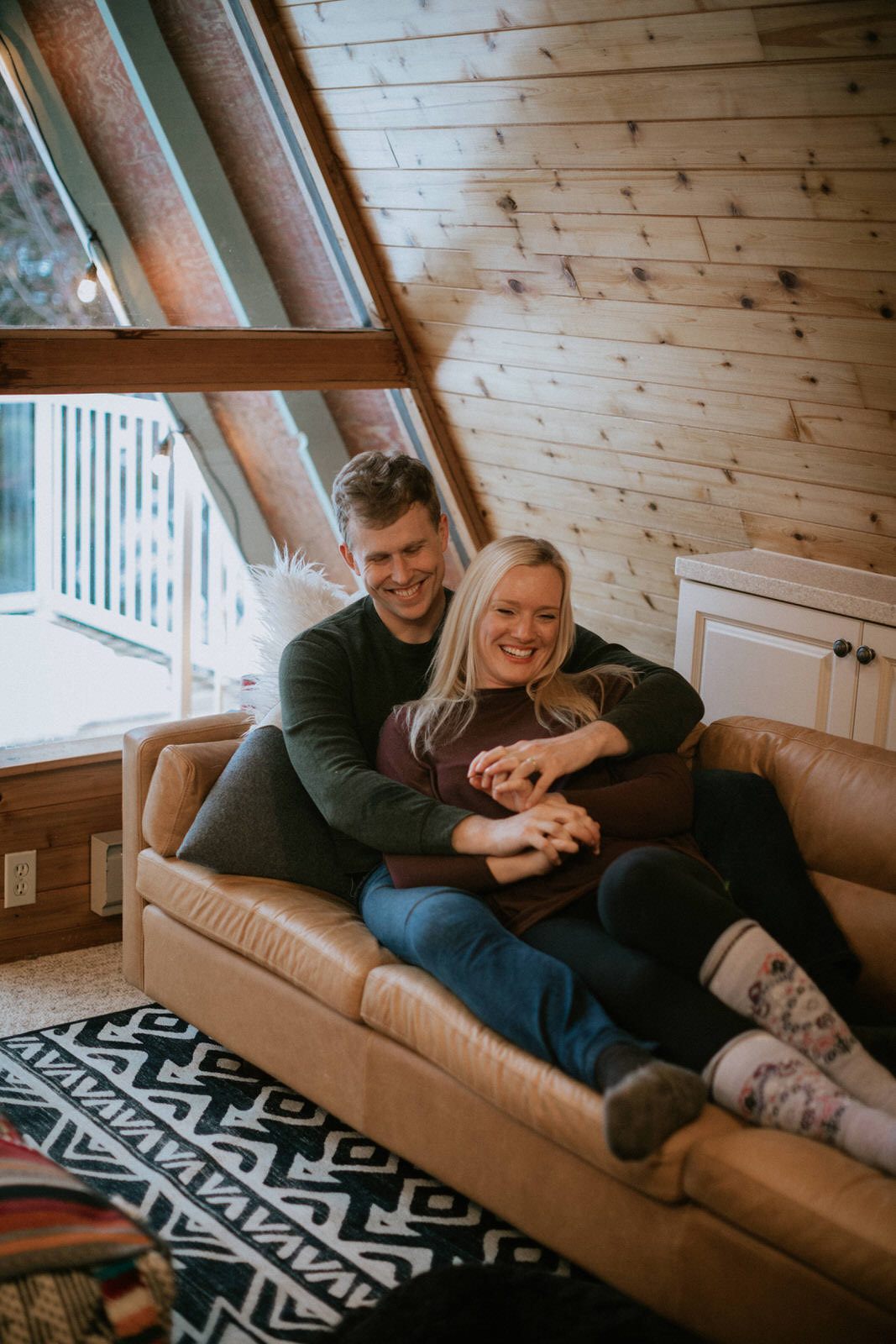 Intimate portrait of a couple at their Lake Wenatchee cabin