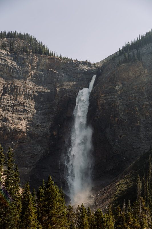 Day hikers on a trail in the Canadian Rockies near Banff