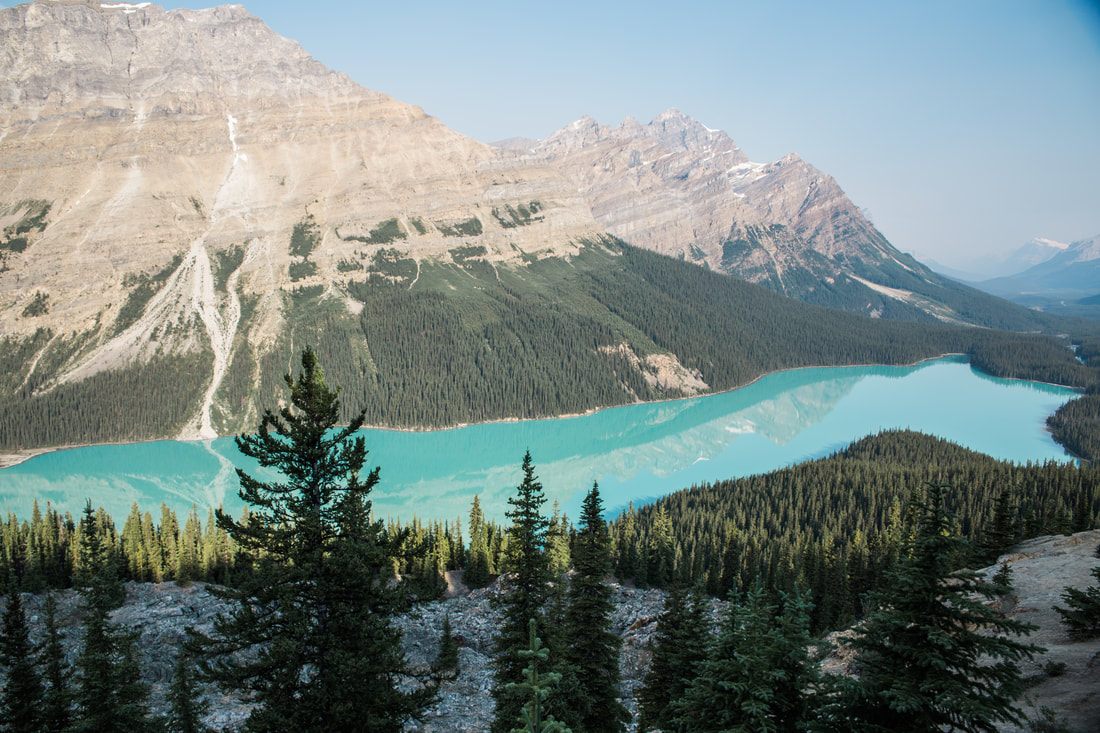 Aerial helicopter view over glacier-fed lakes in Banff National Park