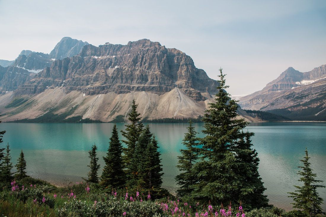 Turquoise alpine lake surrounded by mountains in Banff National Park, Canada