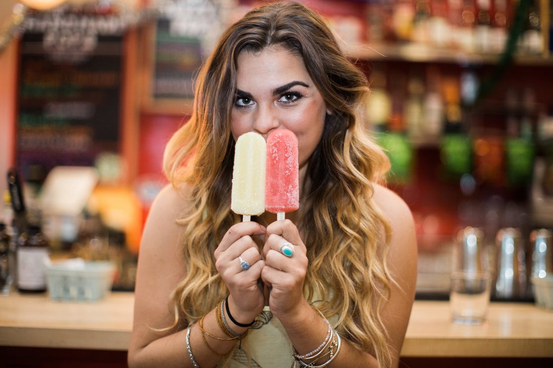 Lindsay modeling in a colorful Christmas-in-July concept shoot in Charleston