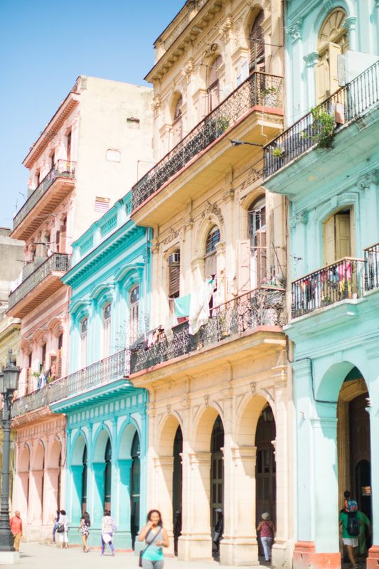 Peeling pastel colonial facade along a Havana street in Cuba