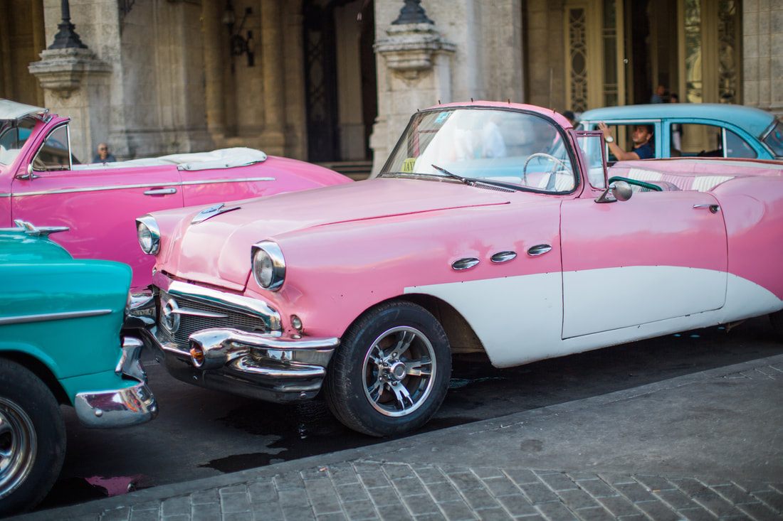 Peeling pastel colonial facade along a Havana street in Cuba