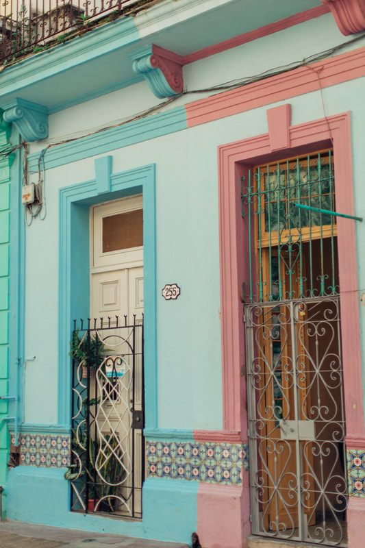 Golden Caribbean light over Havana's colonial architecture