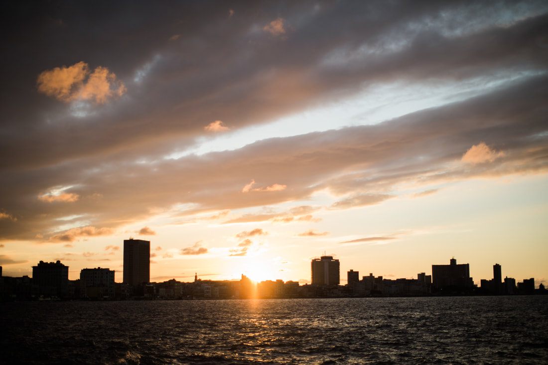 Golden Caribbean light over Havana's colonial architecture
