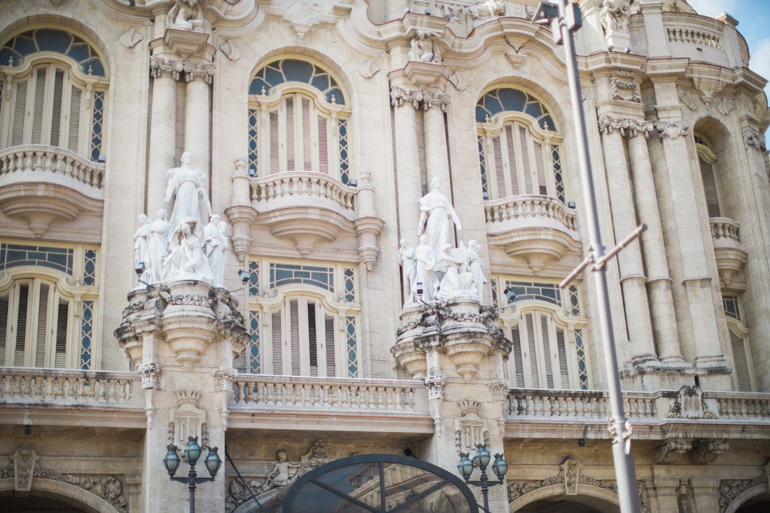 Peeling pastel colonial facade along a Havana street in Cuba