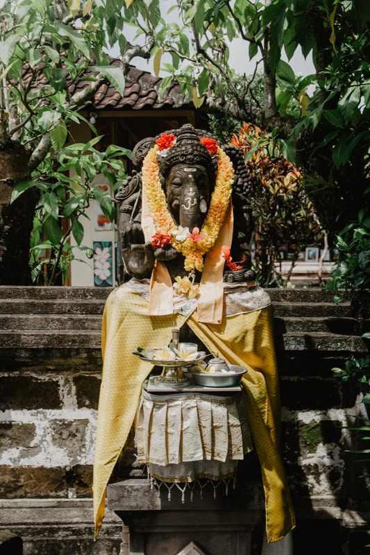 Stone carvings and jungle canopy at the Sacred Monkey Forest Sanctuary, another frame from the trip