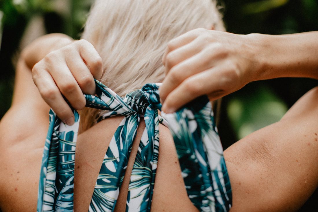Candid jungle-backdrop portrait in a Cheeky Swim one-piece in Bali