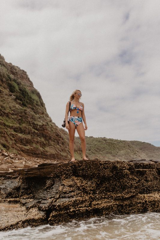 Candid coastal portrait in a Cheeky Swim bikini near Sydney, Australia