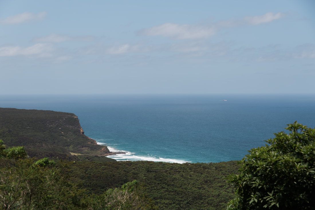 Ocean waves crashing against rocks in Royal National Park, Sydney