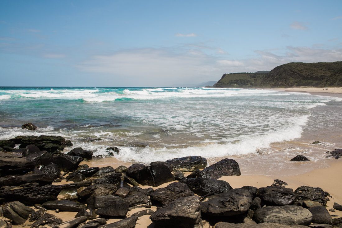 Rugged sandstone cliffs along the coast of Royal National Park, Australia