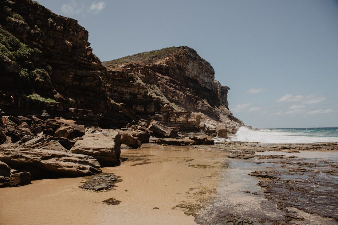 Ocean waves crashing against rocks in Royal National Park, Sydney