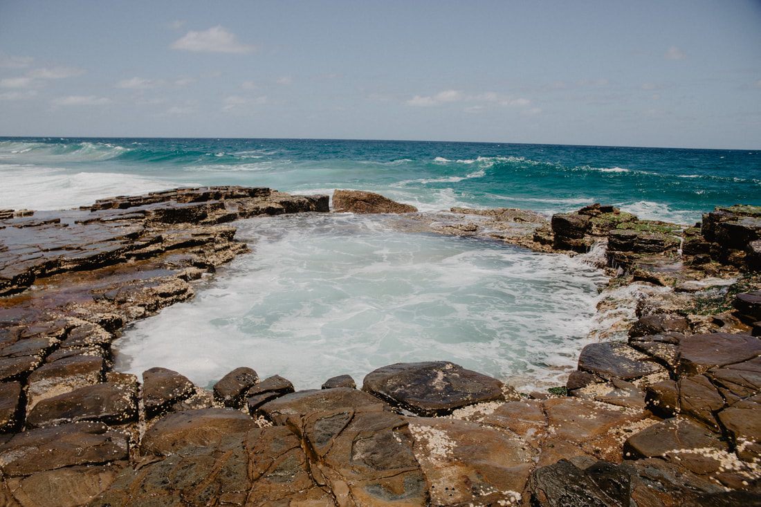 Coastal trail winding along the cliffs of Royal National Park