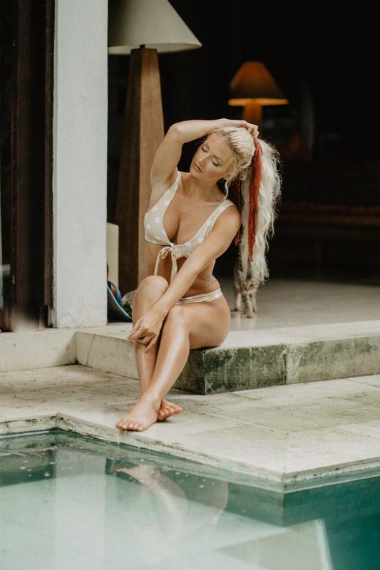 Close-up detail of the Cheeky Swim one-piece styled in Sanur, Bali