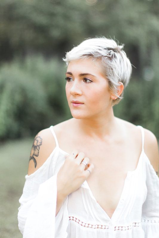 Downtown Charleston portrait session showing soft, light, airy styling.