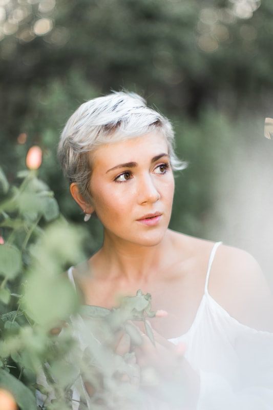 Bright and airy portrait session with soft, natural posing in Charleston, SC.