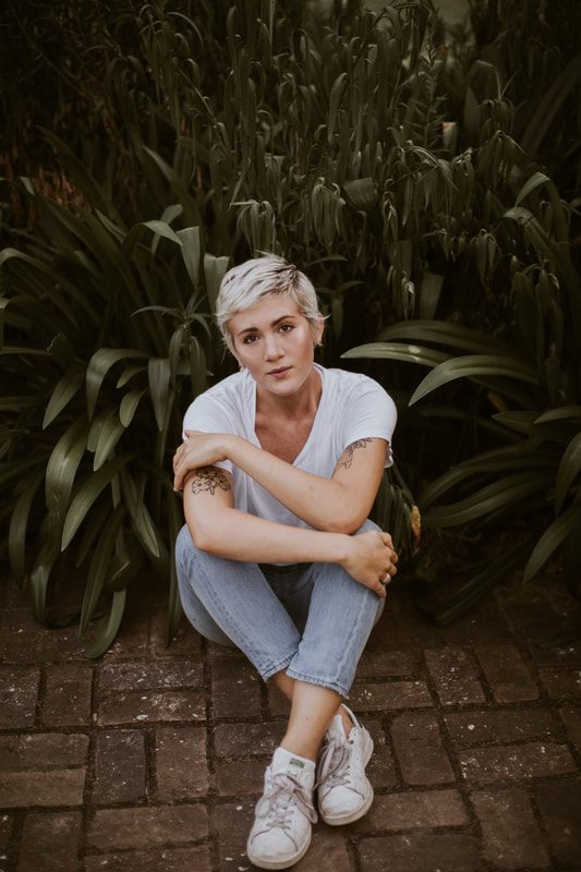 Bright and airy Charleston portrait session with natural, candid expression.