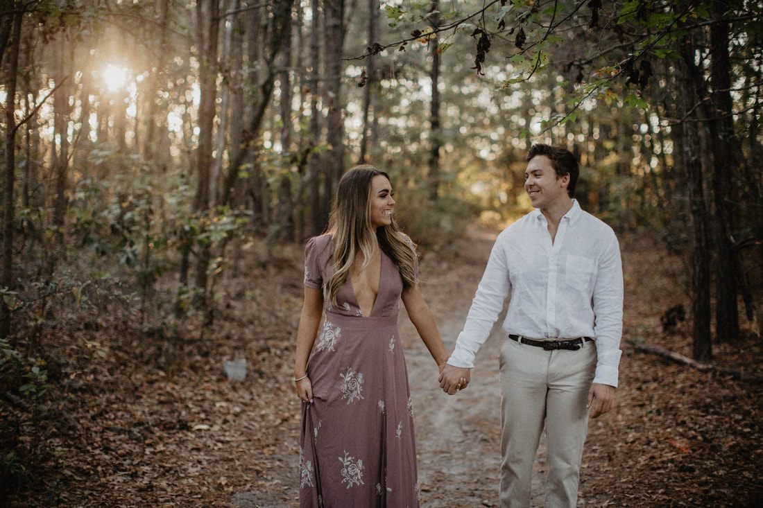 Chase and Mitch pose together during their engagement photoshoot near Charleston, SC.