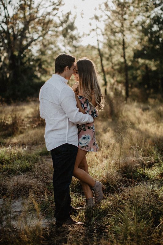 Chase and Mitch share a laugh during their Charleston-area engagement session.
