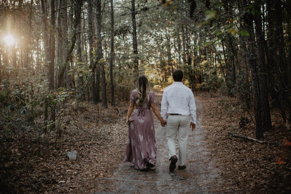 Chase and Mitch share a laugh during their Charleston-area engagement session.