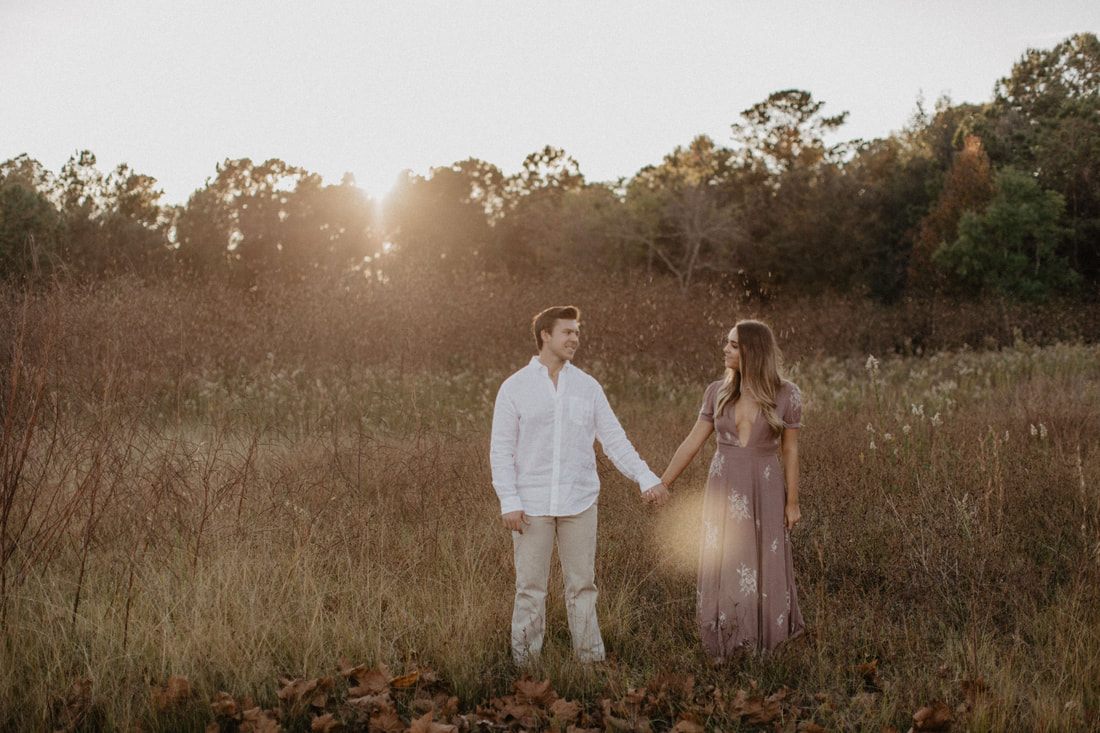 Chase and Mitch share a laugh during their Charleston-area engagement session.
