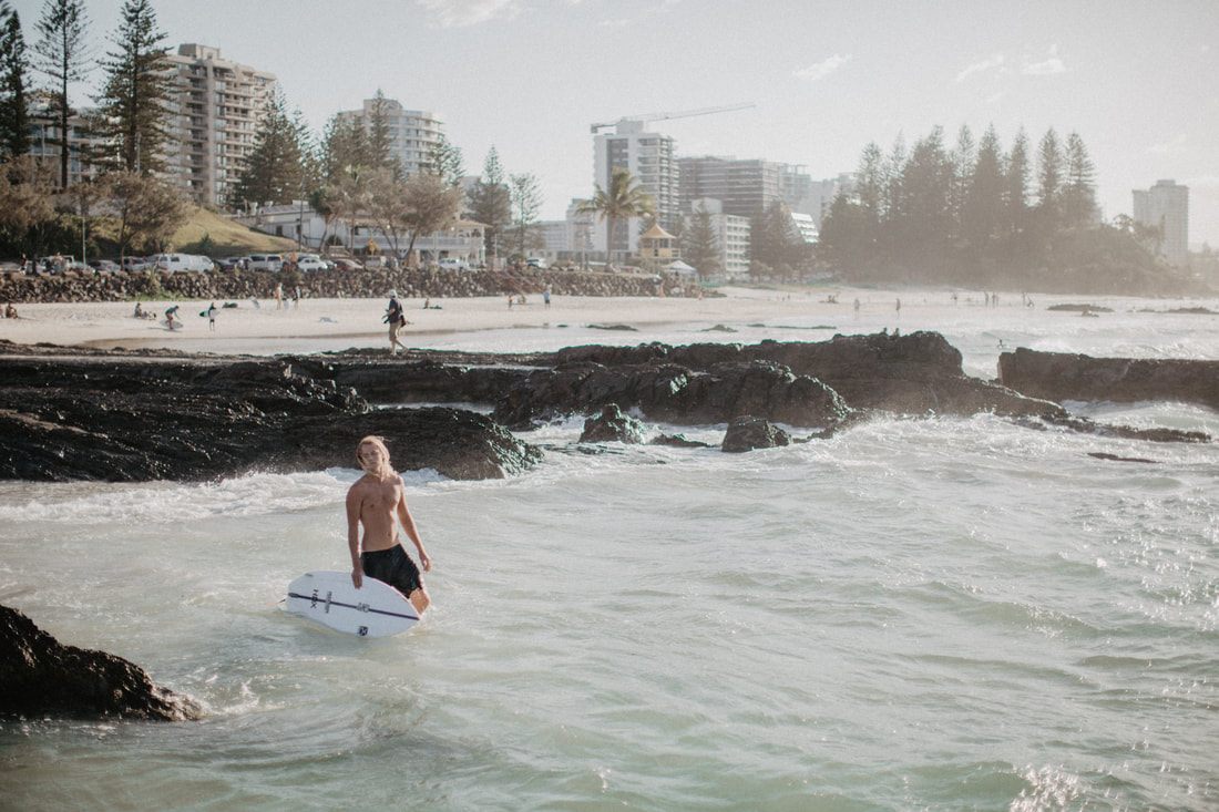 Photo of a quiet beach town street in Currumbin along the Gold Coast between Brisbane and Byron Bay, Australia