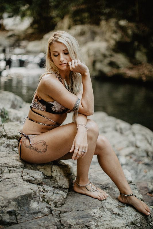 Full-length swimwear portrait against the calm Currumbin, Gold Coast shoreline