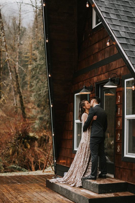 Bride and groom walking together near That PNW Cabin in the Cascades