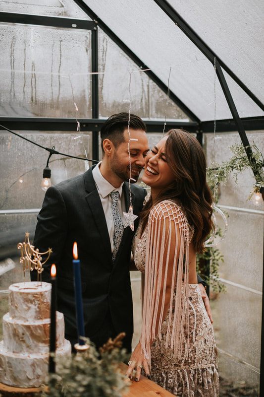 Wide shot of the A-frame cabin decorated for a galaxy-themed elopement