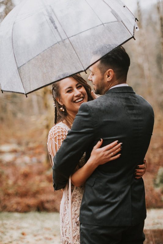 Portrait of the couple in the misty Cascade Mountains near Stevens Pass