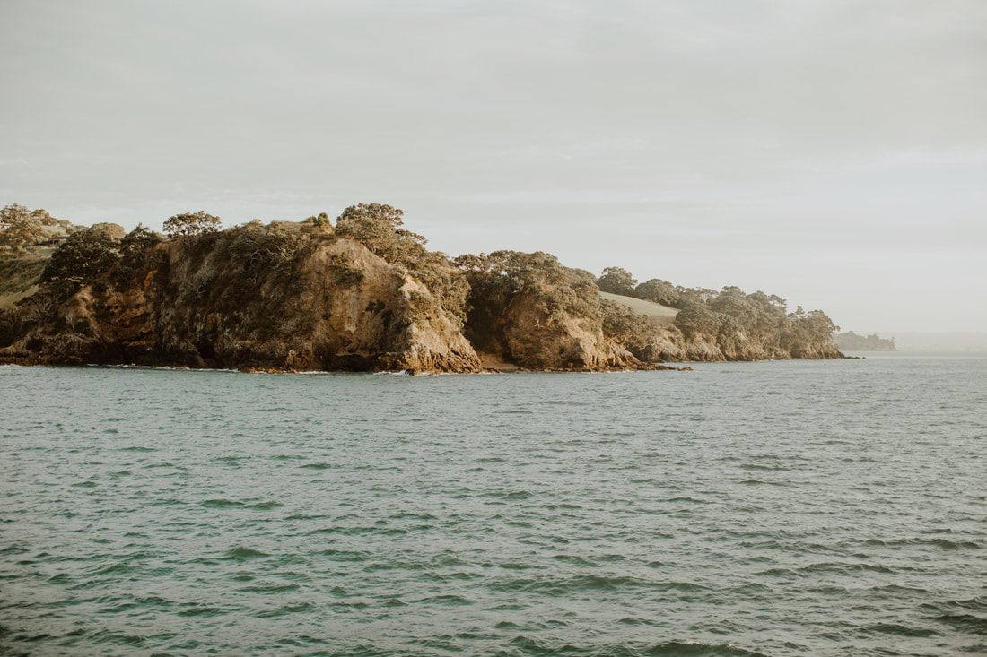 Waiheke Island coastline with rocky outcrops