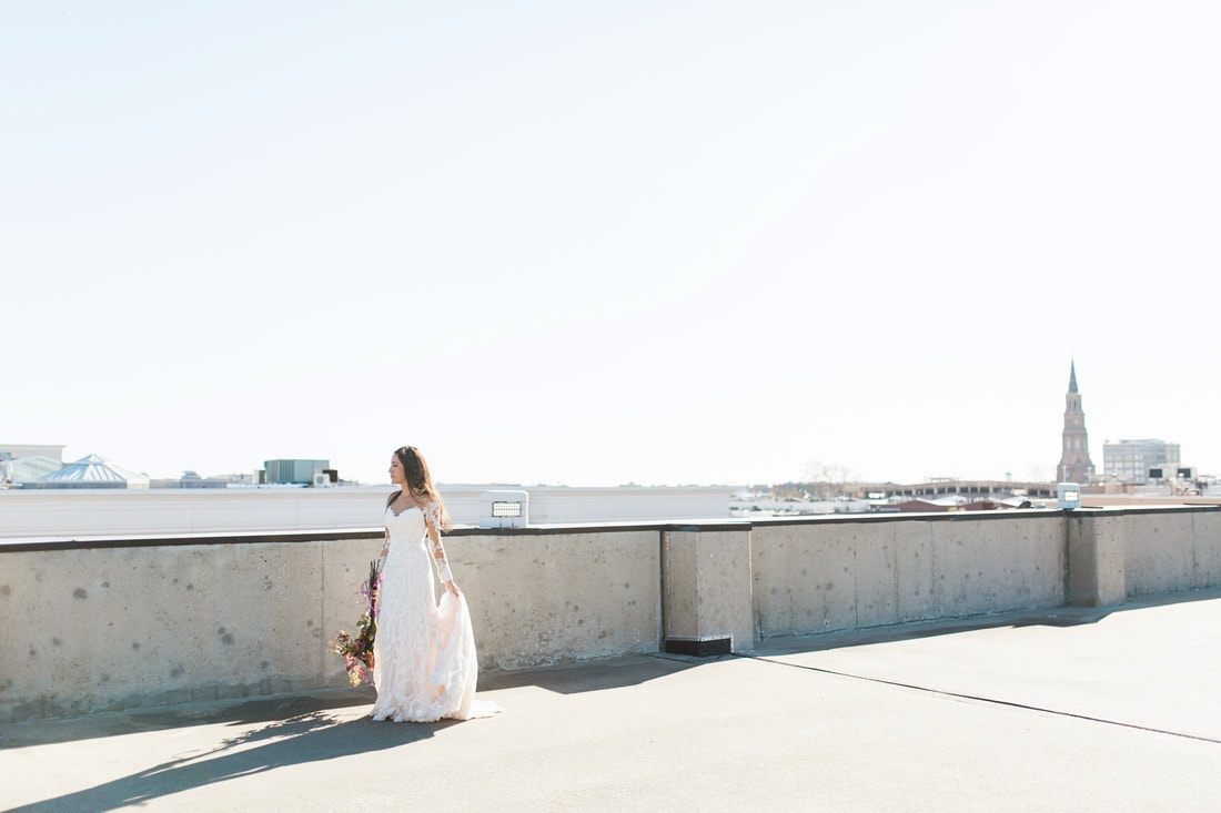 Candid bridal portrait of Olivia laughing during her Charleston session.