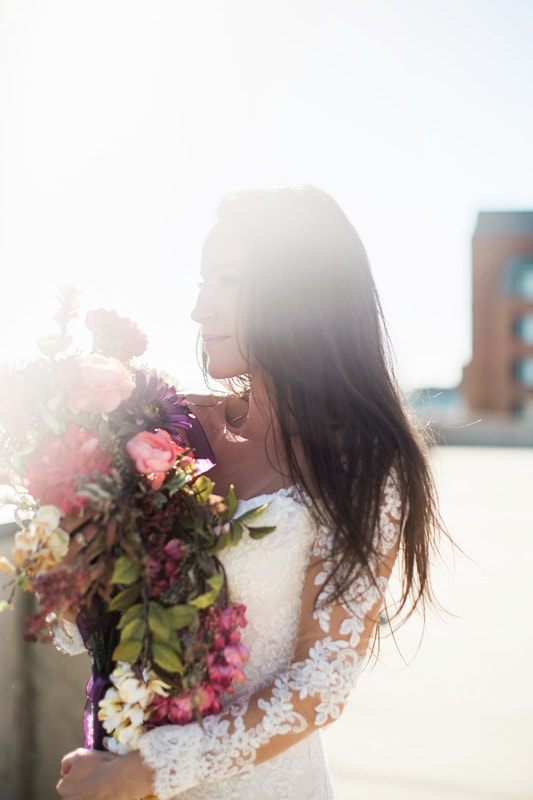 Olivia's gown train fans out in a classic Charleston bridal portrait.